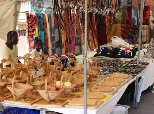 Clothing racks lining the S'Arenal market street